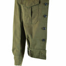Close-up of olive green Greek army Ike jacket sleeve with buttoned cuff and chest pocket detail.