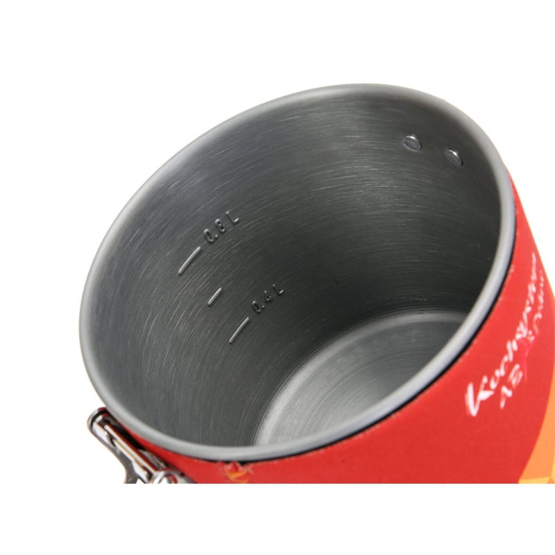 Close-up of a lightweight 0.8 liter trekking pot with neoprene cover for outdoor stove system cooking