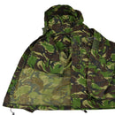 Genuine British SAS military combat smock jacket in DPM camo with hood, multiple pockets, and windproof design.