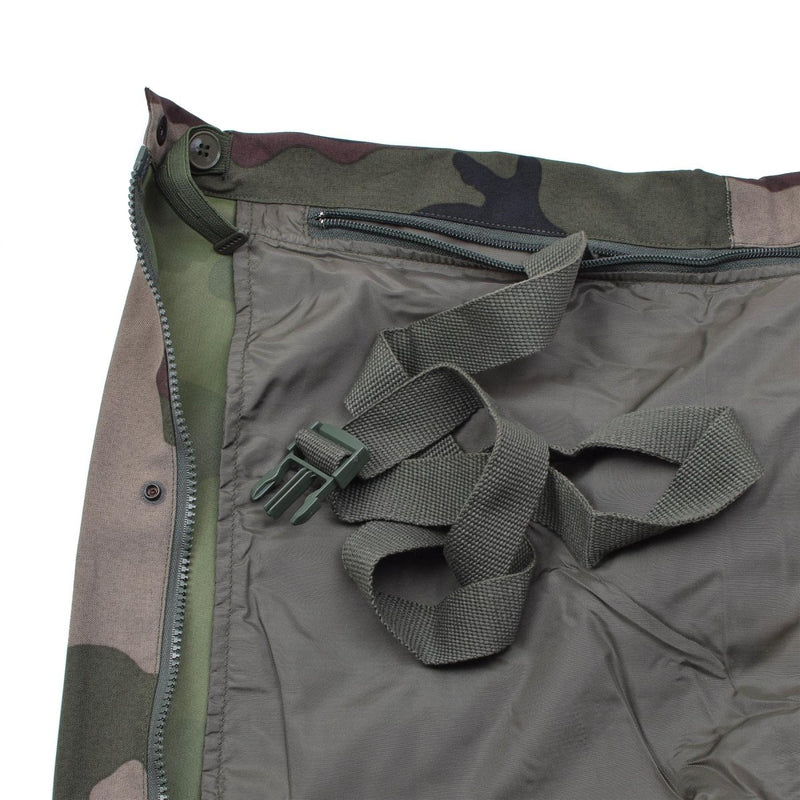Inside view of Genuine French Army waterproof trilaminate rain pants with adjustable braces and CCE camo pattern