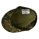 Top view of a new genuine German army Flecktarn cap in BW woodland camouflage with inner label visible