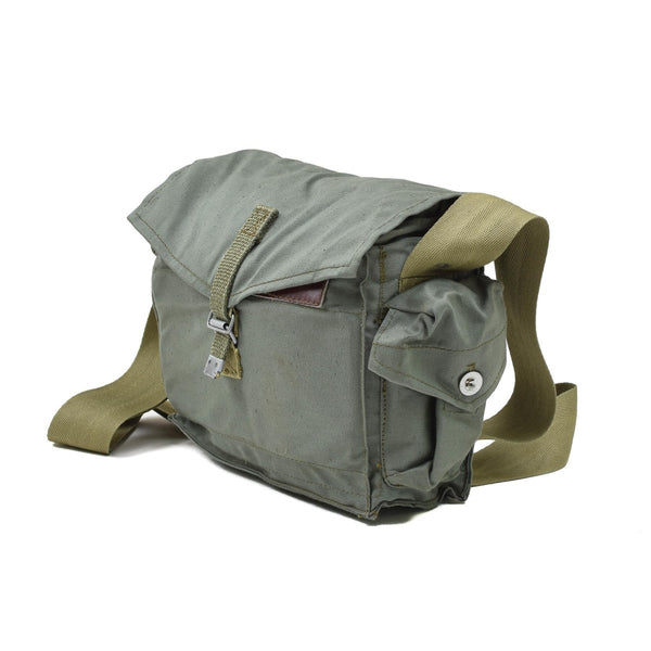 Vintage Polish army gas mask carry bag in olive canvas with shoulder strap, side pocket, and metal buckle closure