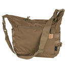 Tan Helikon-Tex Bushcraft Satchel shoulder bag with MOLLE panels, adjustable strap, and multiple zippered pockets for outdoor use