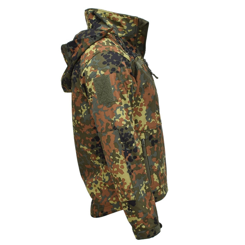 Side view of MIL-TEC Softshell jacket in German flecktarn camo with hood, zippered pockets, and adjustable cuffs
