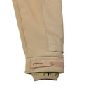 Coyote-colored adjustable cuff of MIL-TEC windproof hiking soft shell jacket with stormproof features.
