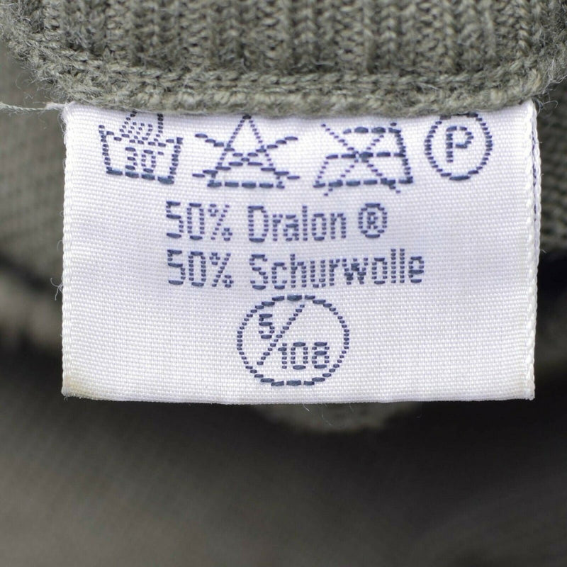 Fabric label with text and symbols on a textured background
