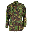 British army BDU combat smock jacket in woodland camo with multiple pockets and adjustable fit for cold weather use.