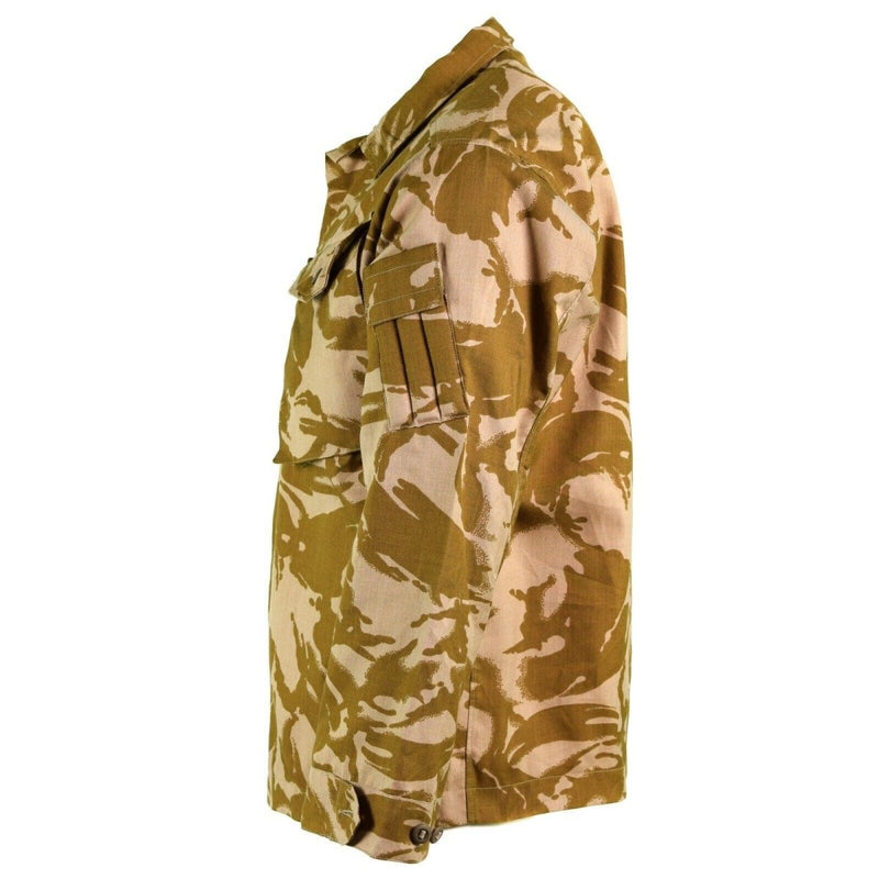 British army desert camo combat jacket made from fire-resistant Kermel Blend with multiple pockets and adjustable cuffs.