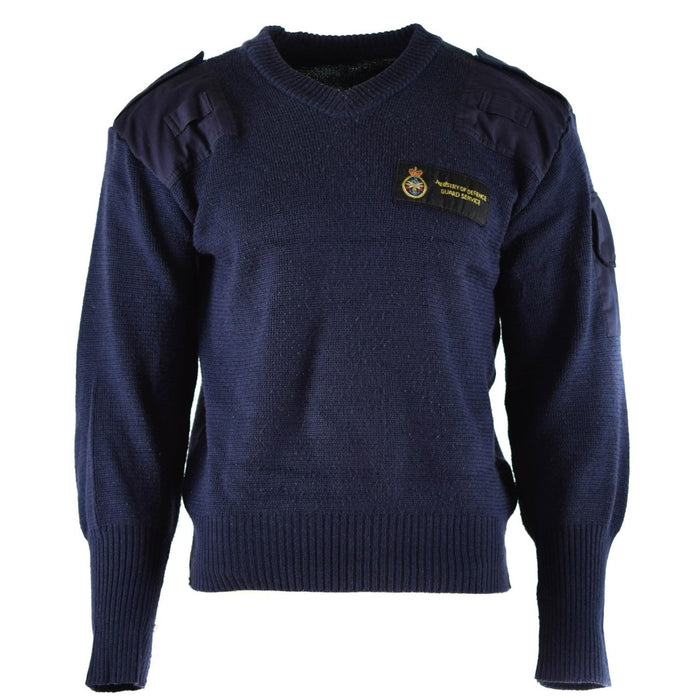 Originele blauwe wollen commandotrui met V-hals van de British Defense Service, versterkte schouders en opgestikte zak.