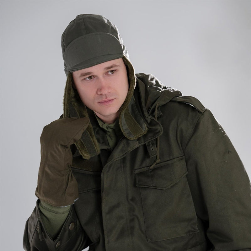 Man wearing original Czech army winter mittens gloves with free trigger finger and olive green military winter gear