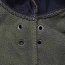 Close-up of olive Dutch military soft shell jacket showing vented armpit mesh and reinforced stitching details