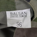 Close-up of a size 96 label on a camo tactical combat shirt made by Balsan in Sousse, Tunisia