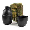 Original British Army canteen set with black water bottle, mug, and woodland camo pouch for outdoor use
