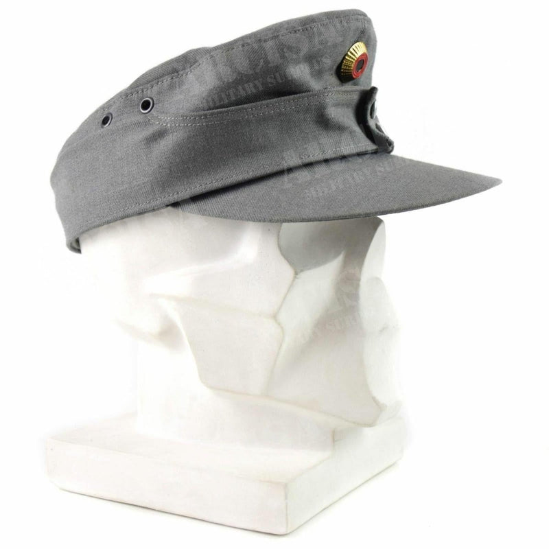 Original German army mountain cap in grey with peaked front and emblem, designed for Gebirgsjäger mountain troops.