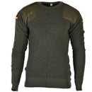 Original German army wool pullover jumper in olive green with reinforced shoulders and German flag patches on sleeves