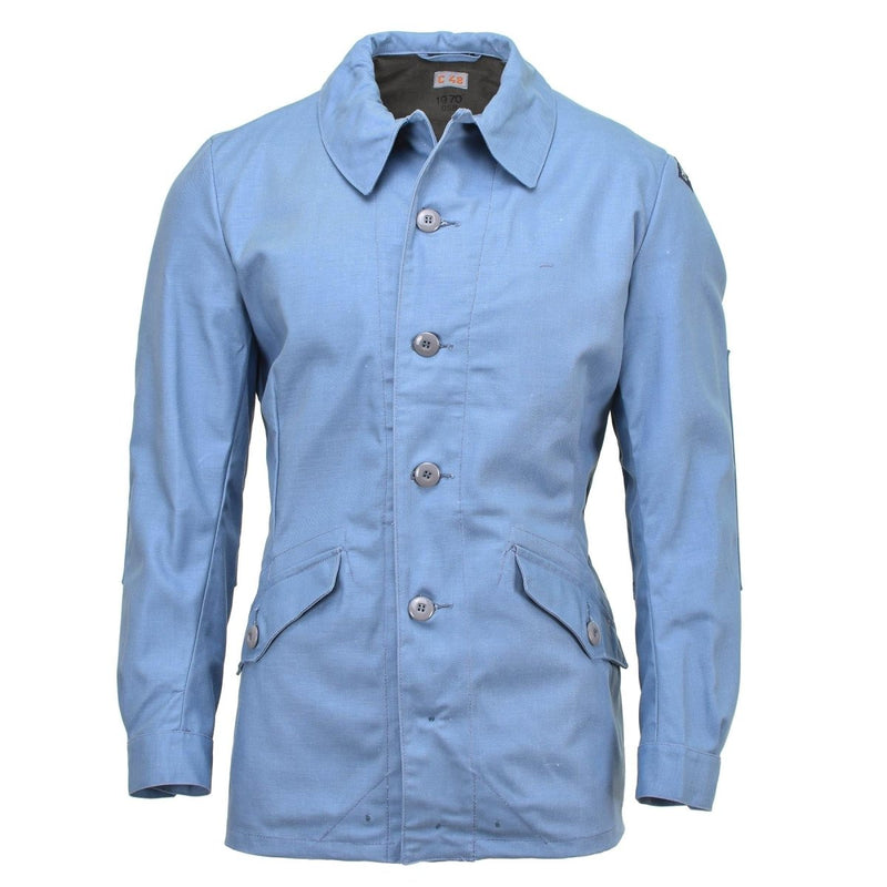 Light blue vintage Swedish Civil Defense jacket with button closure and flap pockets, durable and stylish military outerwear.