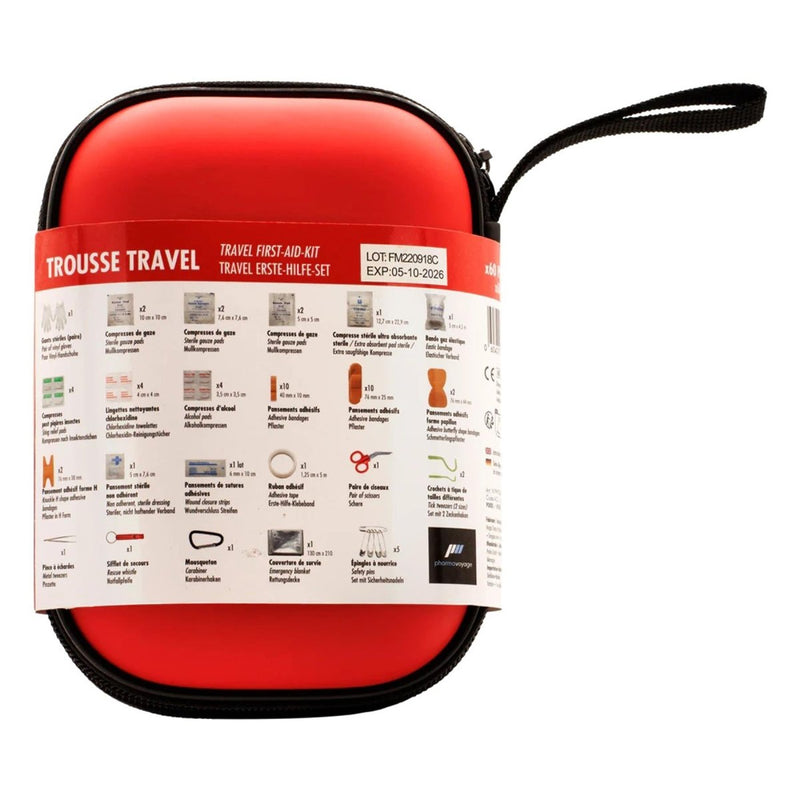 Red travel first aid kit with label on a white background