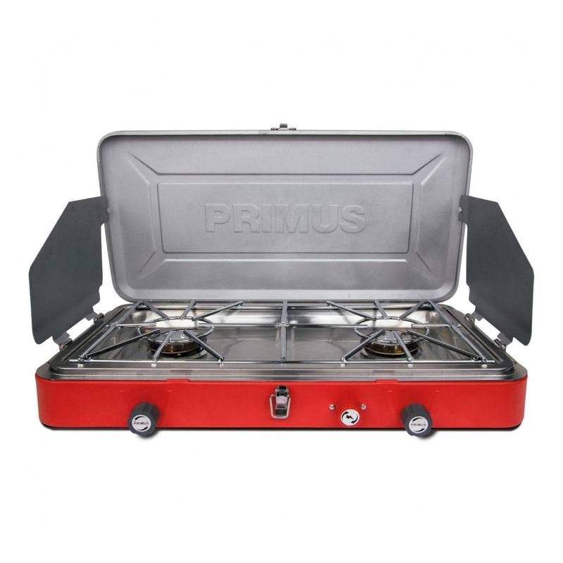 Primus Atle II portable dual burner camping stove with windshields and easy propane connection for outdoor cooking.