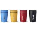 Four Primus Trailbreak vacuum insulated jugs in blue, yellow, red, and black with screw-on lids aligned side by side.