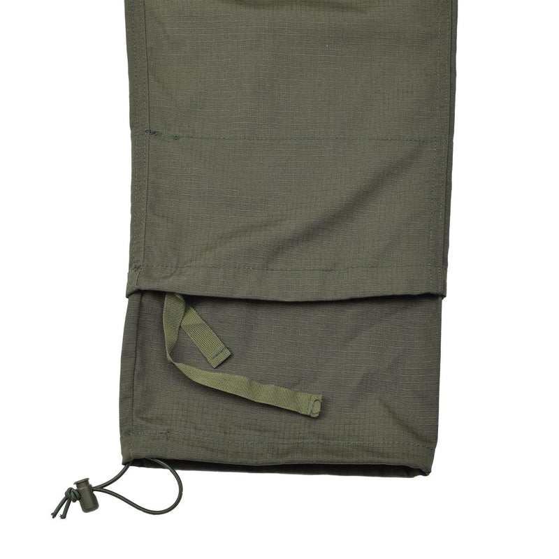 Close-up of olive ripstop TACGEAR military cargo pants hem with adjustable drawstring and reinforced stitching details